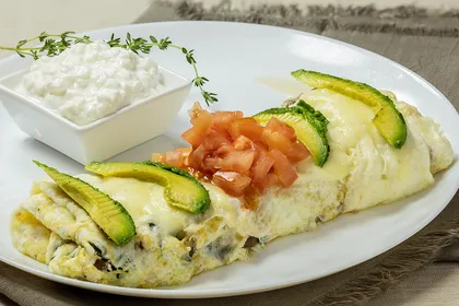 The Californian omelet — egg white omelet with turkey, spinach, mushrooms, jack cheese and sliced avocado